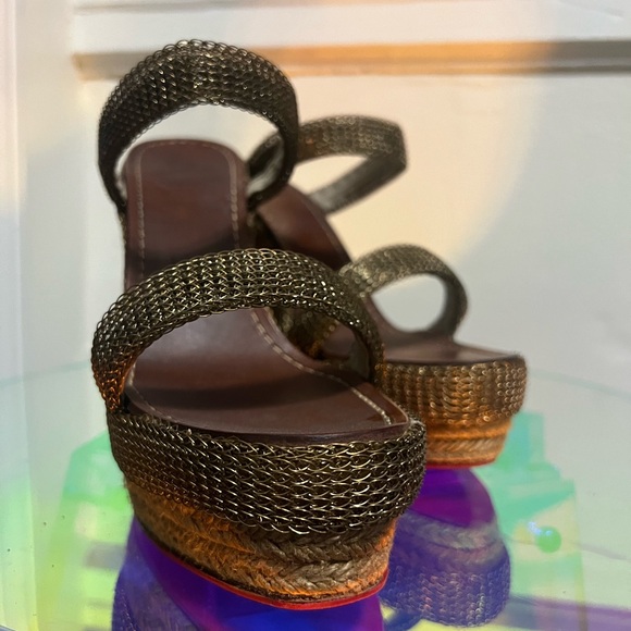 Christian Louboutin Wedges
Great Condition! 
Reinforced red bottoms!
Size 40 - Picture 3 of 6